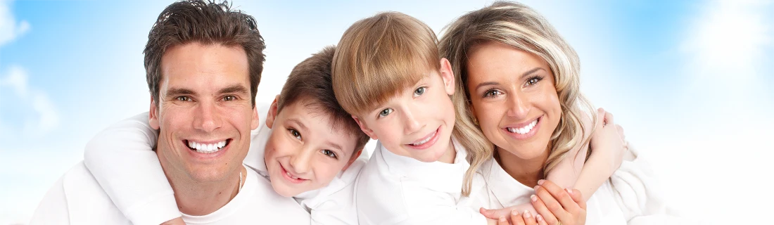Smiling Family At The Dentist
